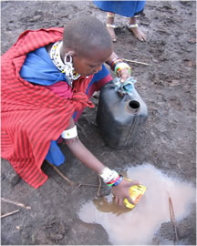 Maasai Girl Hauling Water